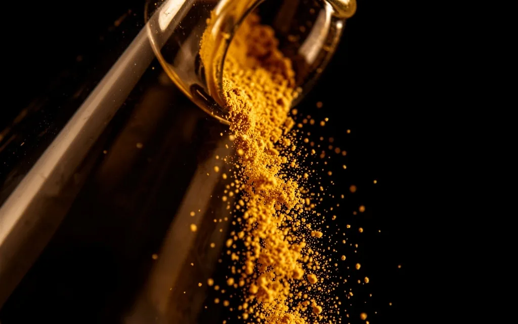 Macro view of natural supplement powder in laboratory glassware