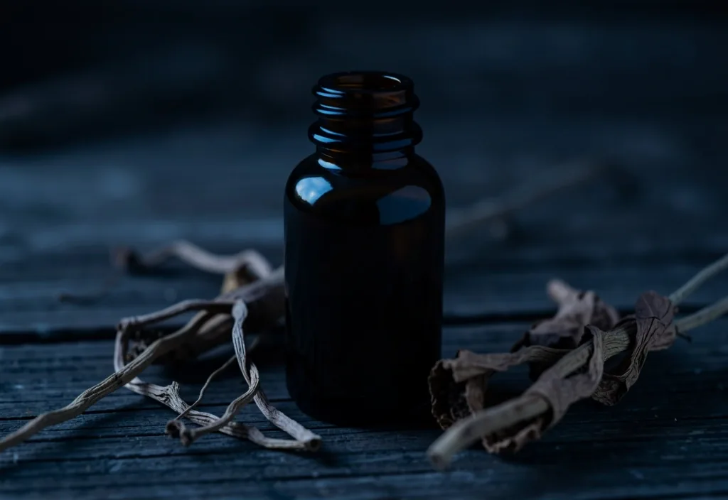 Dark glass tincture bottle on a wooden surface